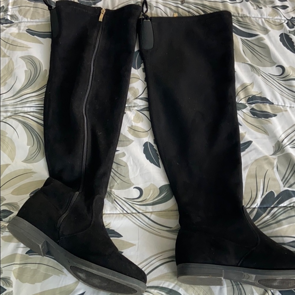 Black thigh high boots